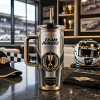 Penske Legacy - Gold and Graphite Trophy Emblem Tumbler